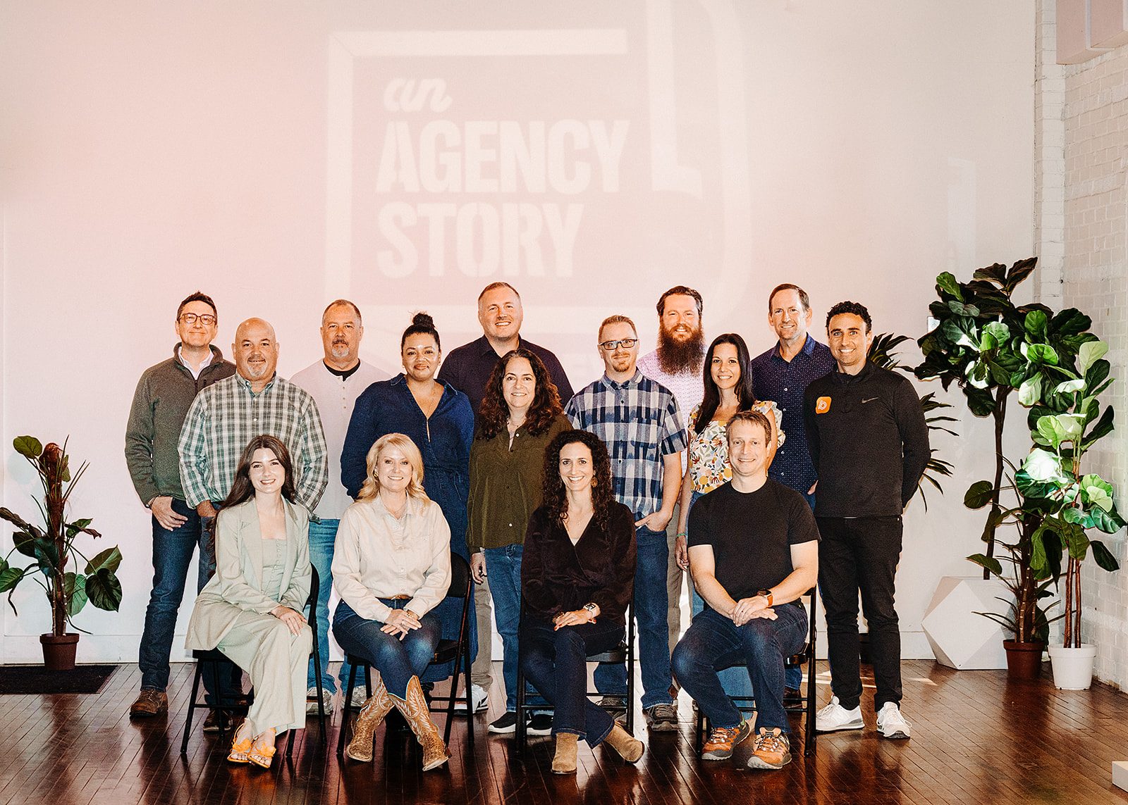 Russel Dubree with the An Agency Story community at a live event