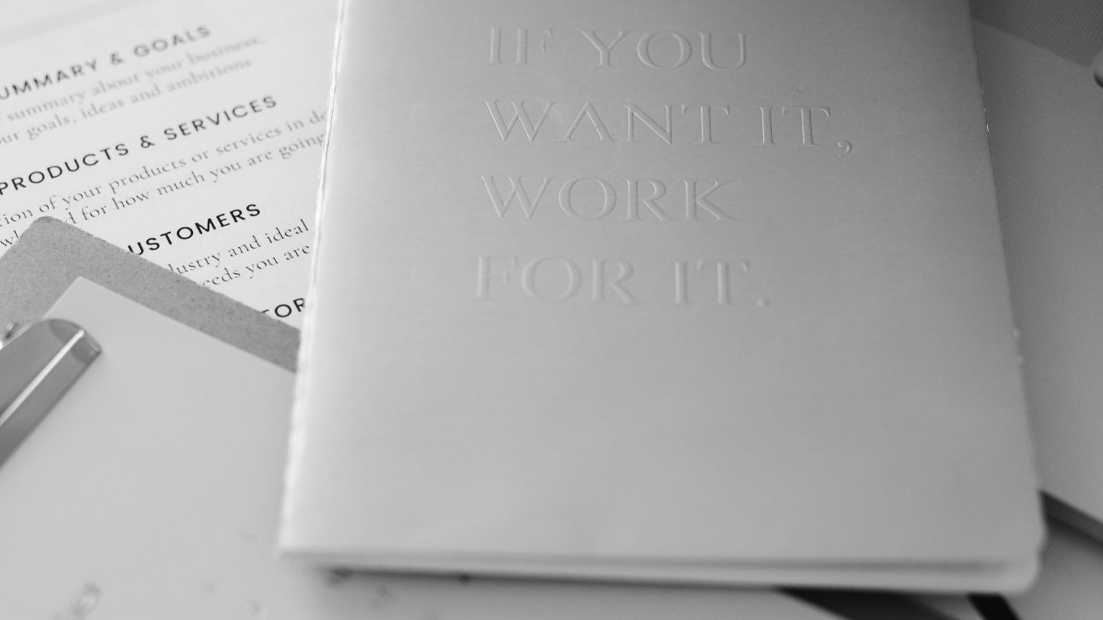 A founder drafting a business plan with the help of AI tools